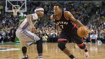 Oct 30, 2015; Boston, MA, USA; Toronto Raptors point guard Kyle Lowry (7) drives the ball against Boston Celtics point guard Isaiah Thomas (4) defending during the 2nd quarter at TD Garden. Mandatory Credit: Gregory J. Fisher-USA TODAY Sports