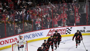 RALEIGH, NC - APRIL 15:The Carolina Hurricanes skate back to the bench after a goal by Carolina Hurricanes left wing Warren Foegele (13) during the second period of the third game of the first round of the Stanley Cup Playoffs between the Washington Capitals and the Carolina Hurricanes on Monday, April 15, 2019. (Photo by Toni L. Sandys/The Washington Post via Getty Images)