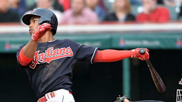 May 16, 2016; Cleveland, OH, USA; Cleveland Indians shortstop Francisco Lindor (12) hits an RBI double against the Cincinnati Reds during the third inning at Progressive Field. Mandatory Credit: Ken Blaze-USA TODAY Sports