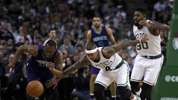 Apr 11, 2016; Boston, MA, USA; Charlotte Hornets guard Kemba Walker (15) steals the ball from Boston Celtics guard Isaiah Thomas (4) during the first half at TD Garden. Mandatory Credit: Bob DeChiara-USA TODAY Sports