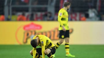 DORTMUND, GERMANY - NOVEMBER 04: Christian Pulisic of Dortmund sits dejected on the pitch during the Bundesliga match between Borussia Dortmund and FC Bayern Muenchen at Signal Iduna Park on November 4, 2017 in Dortmund, Germany. (Photo by Stuart Franklin/Bongarts/Getty Images)