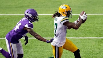 Sep 13, 2020; Minneapolis, MN, USA; Green Bay Packers wide receiver Davante Adams (17) scores a touchdown against Minnesota Vikings cornerback Holton Hill (24) in the third quarter during their football game Sunday, September 13, 2020, at U.S. Bank Stadium in Minneapolis, Minn. Green Bay won 43-34. Mandatory Credit: Dan Powers/Appleton Post-Crescsent-USA TODAY NETWORK