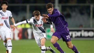FLORENCE - FEBRUARY 18: Tom Carroll of Tottenham and Marcos Alonso of Fiorentina in action during the UEFA Europa League round of 32 first leg match between Fiorentina and Tottenham Hotspur at Stadio Artemio Franchi on February 18, 2016 in Florence, Italy. (Photo by Jean Catuffe/Getty Images)