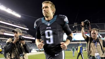 Oct 12, 2014; Philadelphia, PA, USA; Philadelphia Eagles quarterback Nick Foles (9) runs off the field after a win over the against the New York Giants at Lincoln Financial Field. The Eagles defeated the Giants, 27-0. Mandatory Credit: Eric Hartline-USA TODAY Sports