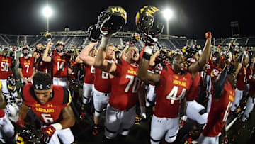 Sep 9, 2016; Miami, FL, USA; Maryland Terrapins teammates sign the school fight song after defeating the FIU Golden Panthers 41-14 at FIU Stadium. Mandatory Credit: Jasen Vinlove-USA TODAY Sports