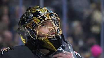 LAS VEGAS, NEVADA - APRIL 16: Marc-Andre Fleury #29 of the Vegas Golden Knights adjusts his mask during a stop in play in the third period of Game Four of the Western Conference First Round against the San Jose Sharks during the 2019 NHL Stanley Cup Playoffs at T-Mobile Arena on April 16, 2019 in Las Vegas, Nevada. The Golden Knights defeated the Sharks 5-0 to take a 3-1 lead in the series. (Photo by Ethan Miller/Getty Images)