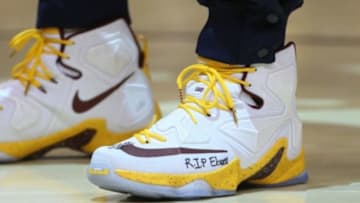 Nov 25, 2015; Toronto, Ontario, CAN; An inscription on the shoe of Cleveland Cavaliers forward LeBron James (23) as he warms up before playing against the Toronto Raptors at Air Canada Centre. The Raptors beat the Cavaliers 103-99. Mandatory Credit: Tom Szczerbowski-USA TODAY Sports