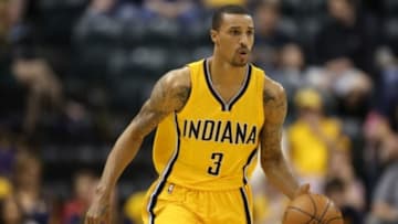 Apr 12, 2015; Indianapolis, IN, USA; Indiana Pacers guard George Hill (3) brings the ball up court against the Oklahoma City Thunder at Bankers Life Fieldhouse. Indiana defeats Oklahoma City 116-104. Mandatory Credit: Brian Spurlock-USA TODAY Sports