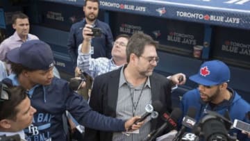 Sep 25, 2015; Toronto, Ontario, CAN; Toronto Blue Jays starting pitcher David Price (right) addresses the media as Tampa Bay Rays starting pitcher Chris Archer (left) holds a microphone during batting practice before a game at Rogers Centre. Mandatory Credit: Nick Turchiaro-USA TODAY Sports