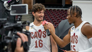 CLEVELAND, OHIO - SEPTEMBER 26: Isaac Okoro #35 interviews Cedi Osman #16 of the Cleveland Cavaliers during Media Day at Rocket Mortgage Fieldhouse on September 26, 2022 in Cleveland, Ohio. NOTE TO USER: User expressly acknowledges and agrees that, by downloading and/or using this photograph, user is consenting to the terms and conditions of the Getty Images License Agreement. (Photo by Jason Miller/Getty Images)