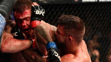 LAS VEGAS, NV - JULY 07: Mike Perry elbows Paul Felder in their welterweight fight during the UFC 226 event inside T-Mobile Arena on July 7, 2018 in Las Vegas, Nevada. (Photo by Josh Hedges/Zuffa LLC/Zuffa LLC via Getty Images)