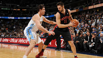 DENVER, CO - JANUARY 27: Linas Kleiza #11 of the Toronto Raptors looks to drive against Danilo Gallinari #8 of the Denver Nuggets on January 27, 2012 at the Pepsi Center in Denver, Colorado. NOTE TO USER: User expressly acknowledges and agrees that, by downloading and/or using this Photograph, user is consenting to the terms and conditions of the Getty Images License Agreement. Mandatory Copyright Notice: Copyright 2012 NBAE (Photo by Garrett W. Ellwood/NBAE via Getty Images)