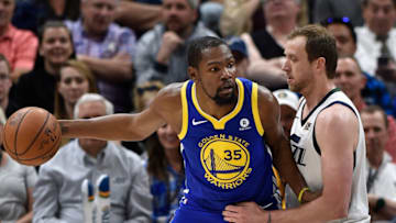 SALT LAKE CITY, UT - APRIL 10: Kevin Durant #35 of the Golden State Warriors drives against Joe Ingles #2 of the Utah Jazz in the first half of a game at Vivint Smart Home Arena on April 10, 2018 in Salt Lake City, Utah. NOTE TO USER: User expressly acknowledges and agrees that, by downloading and or using this photograph, User is consenting to the terms and conditions of the Getty Images License Agreement. (Photo by Gene Sweeney Jr./Getty Images)