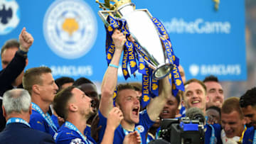LEICESTER, ENGLAND - MAY 07: Jamie Vardy of Leicester City lifts the Premier League Trophy as players and staffs celebrate the season champions after the Barclays Premier League match between Leicester City and Everton at The King Power Stadium on May 7, 2016 in Leicester, United Kingdom. (Photo by Shaun Botterill/Getty Images)