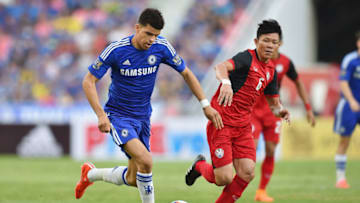 BANGKOK, THAILAND - MAY 30: Dominic Solanke #35 of Chelsea FC (L) and Yuthajak Konjan #6 of Thailand national team (R) competes for the ball during the international friendly match between Thailand All-Stars and Chelsea FC at Rajamangala Stadium on May 30, 2015 in Bangkok, Thailand. (Photo by Thananuwat Srirasant/Getty Images)