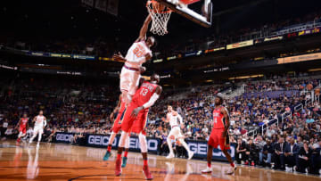 PHOENIX, AZ - APRIL 6: Josh Jackson #20 of the Phoenix Suns dunks against the New Orleans Pelicans on April 6, 2018 at Talking Stick Resort Arena in Phoenix, Arizona. NOTE TO USER: User expressly acknowledges and agrees that, by downloading and or using this photograph, user is consenting to the terms and conditions of the Getty Images License Agreement. Mandatory Copyright Notice: Copyright 2018 NBAE (Photo by Michael Gonzales/NBAE via Getty Images)