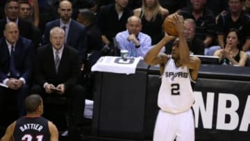 Jun 15, 2014; San Antonio, TX, USA; San Antonio Spurs forward Kawhi Leonard (2) shoots against the Miami Heat in game five of the 2014 NBA Finals at AT&T Center. Mandatory Credit: Soobum Im-USA TODAY Sports