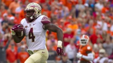 Nov 7, 2015; Clemson, SC, USA; Florida State Seminoles running back Dalvin Cook (4) carries for a touchdown during the first quarter against the Clemson Tigers at Clemson Memorial Stadium. Mandatory Credit: Joshua S. Kelly-USA TODAY Sports