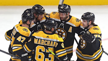 BOSTON - OCTOBER 26: Boston Bruins right wing David Pastrnak (88) and teammates celebrate after Pastrnak's goal gave Boston a 1-0 lead in the first period. The Boston Bruins host the St. Louis Blues in a regular season NHL hockey game at TD Garden in Boston on Oct. 26, 2019. (Photo by Barry Chin/The Boston Globe via Getty Images)