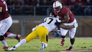 Nov 21, 2015; Stanford, CA, USA;California Golden Bears linebacker Hardy Nickerson (47) tackles Stanford Cardinal running back Barry Sanders (26) during the first quarter at Stanford Stadium. Mandatory Credit: Kelley L Cox-USA TODAY Sports