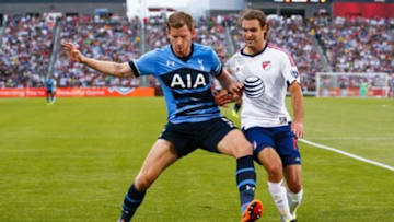 Jul 29, 2015; Denver, CO, USA; Tottenham Hotspur defender Jan Vertonghen (5) defends against MLS All Stars midfielder Graham Zusi (19) of Sporting Kansas City in the first half of the 2015 MLS All Star Game at Dick