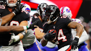 ATLANTA, GA - OCTOBER 01: Devonta Freeman #24 of the Atlanta Falcons runs the ball during the first half against the Buffalo Bills at Mercedes-Benz Stadium on October 1, 2017 in Atlanta, Georgia. (Photo by Kevin C. Cox/Getty Images)