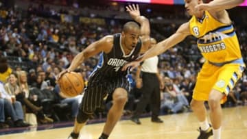 January 9, 2013; Denver, CO, USA; Orlando Magic guard Arron Afflalo (4) drives to the basket during the first half against the Denver Nuggets at the Pepsi Center. Mandatory Credit: Chris Humphreys-USA TODAY Sports