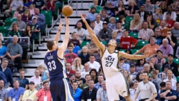 Apr 10, 2015; Salt Lake City, UT, USA; Memphis Grizzlies center Marc Gasol (33) shoots the ball against Utah Jazz center Rudy Gobert (27) during the second half at EnergySolutions Arena. Memphis won 89-88. Mandatory Credit: Russ Isabella-USA TODAY Sports