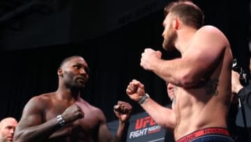 NEWARK, NJ - JANUARY 29: Opponents Anthony Johnson and Ryan Bader face off during the UFC weigh-in at the Amerihealth Pavilion on January 29, 2016 in Newark, New Jersey. (Photo by Ed Mulholland/Zuffa LLC/Zuffa LLC via Getty Images)