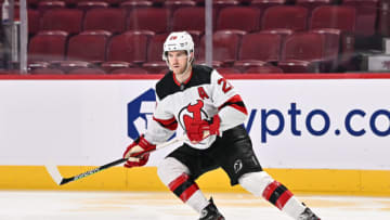 MONTREAL, QC - FEBRUARY 08: Damon Severson #28 of the New Jersey Devils skates against the Montreal Canadiens during the third period at Centre Bell on February 8, 2022 in Montreal, Canada. The New Jersey Devils defeated the Montreal Canadiens 7-1. (Photo by Minas Panagiotakis/Getty Images)