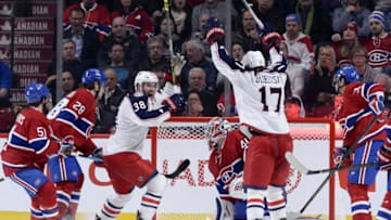 Jan 26, 2016; Montreal, Quebec, CAN; Columbus Blue Jackets forward Brandon Dubinsky (17) reacts with teammate Boone Jenner (38) after scoring a goal against Montreal Canadiens goalie Ben Scrivens (40) during the second period at the Bell Centre. Mandatory Credit: Eric Bolte-USA TODAY Sports