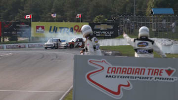 BOWMANVILLE, ON - AUGUST 26: Noah Gragson, driver of the #18 Safelite AutoGlass Toyota, takes out Todd Gilliland, driver of the #4 Frontline Toyota, on the final turn of the final lap as they both spin off the track at Canadian Tire Mosport Park on August 26, 2018 in Bowmanville, Canada. (Photo by Tom Szczerbowski/Getty Images)