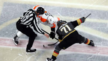 LAS VEGAS, NEVADA - JANUARY 02: William Karlsson #71 of the Vegas Golden Knights faces off with Kevin Hayes #13 of the Philadelphia Flyers during the second period at T-Mobile Arena on January 02, 2020 in Las Vegas, Nevada. (Photo by Zak Krill/NHLI via Getty Images)