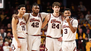 Jan 16, 2023; Minneapolis, Minnesota, USA; Illinois Fighting Illini guard RJ Melendez (15), forward Dain Dainja (42), forward Matthew Mayer (24), and guard Jayden Epps (3) looks on during the second half against the Minnesota Golden Gophers at Williams Arena. Mandatory Credit: Matt Krohn-USA TODAY Sports
