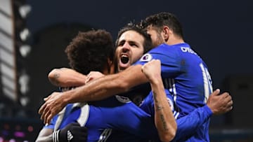 LONDON, ENGLAND - DECEMBER 31: Willian (L) of Chelsea celebrates scoring his team's third goal with his team mates Cesc Fabregas (C) and Diego Costa (R) during the Premier League match between Chelsea and Stoke City at Stamford Bridge on December 31, 2016 in London, England. (Photo by Darren Walsh/Chelsea FC via Getty Images)