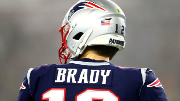 FOXBOROUGH, MASSACHUSETTS - JANUARY 04: A detail of the jersey of Tom Brady #12 of the New England Patriots in the AFC Wild Card Playoff game against the Tennessee Titans at Gillette Stadium on January 04, 2020 in Foxborough, Massachusetts. (Photo by Adam Glanzman/Getty Images)