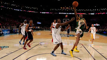 NEW ORLEANS - FEBRUARY 15: Kevin Durant #35 of the Rookie team of the Sophomore team lays the ball up over Paul Millsap #24 of the Rookie team during the T-Mobile Rookie Challenge & Youth Jam part of 2008 NBA All-Star Weekend at the New Orleans Arena on February 15, 2008 in New Orleans, Louisiana. The Sophomores won 136-109. NOTE TO USER: User expressly acknowledges and agrees that, by downloading and or using this photograph, User is consenting to the terms and conditions of the Getty Images License Agreement. (Photo by Ronald Martinez/Getty Images)