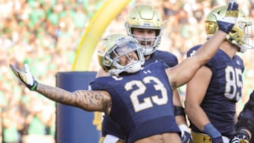 SOUTH BEND, IN - SEPTEMBER 18: Kyren Williams #23 of the Notre Dame Fighting Irish celebrates a touchdown during the second half against the Purdue Boilermakers at Notre Dame Stadium on September 18, 2021 in South Bend, Indiana. (Photo by Michael Hickey/Getty Images)