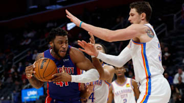 Pistons forward Saddiq Bey (41) is defended by OKC Thunder center Mike Muscala (33): Rick Osentoski-USA TODAY Sports