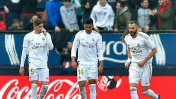 (L to R) Real Madrid's Uruguayan midfielder Federico Valverde, Real Madrid's Brazilian midfielder Casemiro and Real Madrid's French forward Karim Benzema react to Osasuna's opening goal during the Spanish league football match between CA Osasuna and Real Madrid CF at El Sadar stadium in Pamplona on February 9, 2020. (Photo by ANDER GILLENEA / AFP) (Photo by ANDER GILLENEA/AFP via Getty Images)