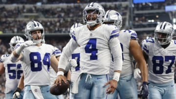 Nov 14, 2021; Arlington, Texas, USA; Dallas Cowboys quarterback Dak Prescott (4) celebrates scoring a touchdown in the third quarter against the Atlanta Falcons at AT&T Stadium. Mandatory Credit: Tim Heitman-USA TODAY Sports