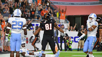 MIAMI, FL - SEPTEMBER 27: Darrell Langham #81 of the Miami Hurricanes scores a touchdown in the second quarter against the North Carolina Tar Heels at Hard Rock Stadium on September 27, 2018 in Miami, Florida. (Photo by Mark Brown/Getty Images)