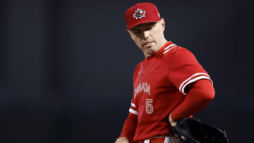 PHOENIX, ARIZONA - MARCH 12: Freddie Freeman #5 of Team Canada gestures during the first inning of the World Baseball Classic Pool C game against Team Great Britain at Chase Field on March 12, 2023 in Phoenix, Arizona. (Photo by Chris Coduto/Getty Images)