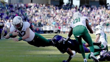 FORT WORTH, TEXAS - NOVEMBER 09: Charlie Brewer #12 of the Baylor Bears scores a touchdown against the TCU Horned Frogs in the second overtime period at Amon G. Carter Stadium on November 09, 2019 in Fort Worth, Texas. (Photo by Tom Pennington/Getty Images)
