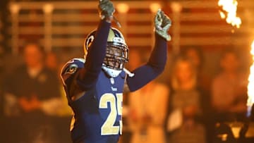 Nov 15, 2015; St. Louis, MO, USA; St. Louis Rams strong safety T.J. McDonald (25) is introduced to the crowd prior to a game against the Chicago Bears at the Edward Jones Dome. The Bears won the game 37-13. Mandatory Credit: Billy Hurst-USA TODAY Sports