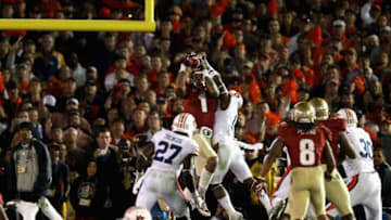 PASADENA, CA - JANUARY 06: Wide receiver Kelvin Benjamin #1 of the Florida State Seminoles catches a 2-yard pass for a touchdown to take a 33-31 lead in the final moments of the fourth quarter during the 2014 Vizio BCS National Championship Game at the Rose Bowl on January 6, 2014 in Pasadena, California. (Photo by Jeff Gross/Getty Images)