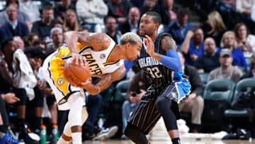 INDIANAPOLIS, IN - NOVEMBER 9: George Hill #3 of the Indiana Pacers handles the ball against defense from C.J. Watson #32 of the Orlando Magic during a game at Bankers Life Fieldhouse on November 9, 2015 in Indianapolis, Indiana. The Pacers defeated the Magic 97-84. NOTE TO USER: User expressly acknowledges and agrees that, by downloading and or using the photograph, User is consenting to the terms and conditions of the Getty Images License Agreement. (Photo by Joe Robbins/Getty Images)