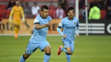 May 27, 2015; Toronto, Ontario, Canada; Manchester City forward Sergio Aguero (16) advances the ball upfield alongside midfielder David Silva (21) during the second half of an international club friendly at BMO Field against Toronto FD. Manchester City won 1-0. Mandatory Credit: Dan Hamilton-USA TODAY Sports