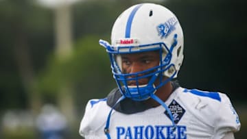 Pahokee quarterback Austin Simmons (13) is seen during warmups prior to the start of the football game between Pahokee and host Palm Beach Central on Friday, September 16, 2022, in Wellington, FL. Final score, Pahokee, 34, Palm Beach Central, 14.
