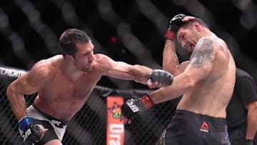 12 December 2015; Luke Rockhold, left, in action against Chris Weidman during their middleweight bout. UFC 194: Undercard, MGM Grand Garden Arena, Las Vegas, USA. Picture credit: Ramsey Cardy / SPORTSFILE (Photo by Sportsfile/Corbis via Getty Images)